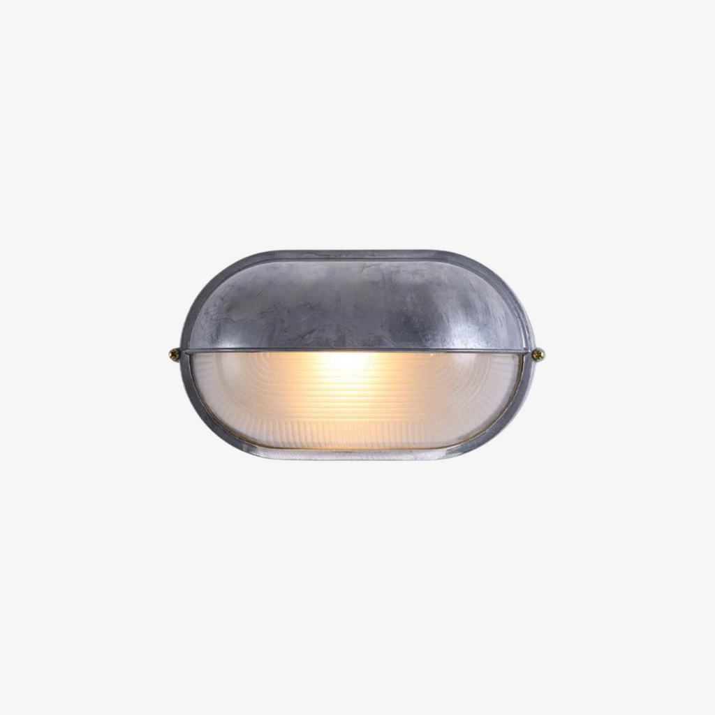 Outdoor Bulkhead Wall Light with Oval Shield and Ribbed Glass Diffuser - Image 1